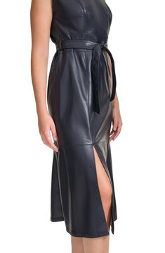 Give your wardrobe an edge with a sleeveless faux-leather midi dress fashioned with a belted tie waist and thigh-high slit. 45" length Back-zip closure Jewel neck Sleeveless Attached waist ties Unlined 100% polyester with polyurethane coating Dry clean Imported Sleevless Dress, Leather Midi Dress, Concert Looks, Belted Midi Dress, Preppy Look, Fitted Suit, Kids Outerwear, Sweaters And Leggings, Jewel Neck