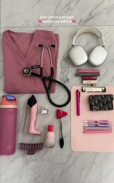 the contents of a doctor's bag laid out on a marble surface