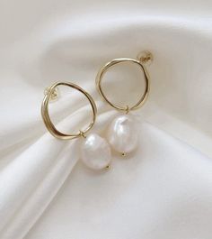 Baroque Pearl Drop Earrings, CZ Bridal Earrings, Statement Earrings, Silver Bridal Earrings, Bridesmaid Earrings,CZ Wedding Earrings,Bridesmaids Gift DETAILS * Finishes: * Baroque Pearl Earrings * 18K gold plated ,925 silver * Hoop size: 15 mm * Pearl size: 10 mm * Hypoallergenic, lead-free & nickel-free. Pear-shaped Wedding Hoop Earrings, White Pear-shaped Hoop Earrings For Wedding, Single Pearl Earring For Wedding, Bridal Earrings Statement, Bridesmaid Earring, Statement Earrings Gold, Silver Bridal Earrings, Bridal Statement Earrings, Bridal Earring