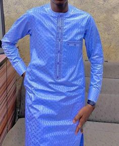 Mens africa wear is a handmade product . Luxury wear for any outings. Traditional marriage, birthday party or any occasion is lovely for this attire.  MADE TO ORDER > ensure you provide your real measurements. And  we will custom make it to fit your body. NB: when ordering your bazin the pattern Formal Blue Long Sleeve Agbada, Blue Traditional Formal Agbada, Formal Long Sleeve Kurta With Traditional Patterns, Long Sleeve Agbada For Eid Party, Fitted Long Sleeve Agbada For Traditional Ceremonies, Festive Long Sleeve Agbada For Party, Fitted Long Sleeve Agbada For Eid, Elegant Long Sleeve Agbada With Traditional Patterns, Fitted Long Sleeve Agbada For Festive Occasions