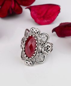 925 Sterling Silver Opaque Ruby Red Corundum Artisan Crafted Filigree Oval Cocktail Statement Ring Women Jewelry Gifts Boxed for Her Material: 925 Solid Sterling Silver Opaque Ruby Corundum Gemstone Dimensions : 14 mm x 7 mm, Approximate Total Carat Weight: 3.4 Ring Face Length: 0.95 inches Width: 0.60 inches Nickel free This will come in a designer pouch & gift box with a romance card Free Domestic Shipping It is a gift that will create memories for years to come. Our fine silver jewelry is Ruby Silver Ring, Fine Silver Jewelry, Rainbow Quartz, Create Memories, Sterling Silver Filigree, Ring Women, Genuine Turquoise, Artisan Craft, Turquoise Gemstone