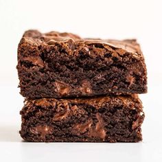 two chocolate brownies stacked on top of each other