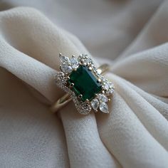 Luxury Timeless Diamond Ring With Birthstone, Luxury Yellow Gold Emerald Engagement Ring, Luxury Yellow Gold Emerald Ring For Wedding, Luxury White Gold Emerald Ring For May Birthstone, Luxury Yellow Gold Emerald Ring For Women, Luxury Heart Cut Emerald Ring For Formal Occasions, Emerald Ring Design, Green Wedding Rings, Fantasy Clothes