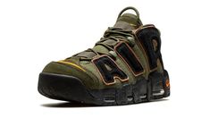 The Nike Air More Uptempo “Cargo Khaki” is an earth tone colorway of Scottie Pippen’s former signature shoe.  The Air More Uptempo debuted back in 1996 is was worn by Pippen with the Chicago Bulls during the team’s historic 1995-96 season in the NBA.  On the “Cargo Khaki,” the shoe receives a makeover that includes olive green-colored leather on its base and black suede oversized “AIR” branding on either side.  An orange Swoosh logo is embroidered on the toe and a Jeweled Swoosh appears on the h Nike Air More Uptempo, Nike Air More, Scottie Pippen, Kicks Shoes, Cargo Khaki, Stadium Goods, Swoosh Logo, Colored Leather, Chicago Bulls