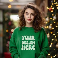 Elevate your sweatshirt designs with this premium Irish Green Christmas Gildan 18000 Sweatshirt Mockup! 🚀 Ideal for Etsy sellers and designers, this crewneck women model mockup will make your designs stand out effortlessly.  WHAT IS INCLUDED: 📸 1 high-resolution JPG image, for showcasing you designs beautifully.  Once your payment is confirmed, you'll receive the download link via Etsy email and also find it in your Etsy profile's purchase section.  HOW TO USE: Simply overlay your design onto Christmas Mockup, Sweatshirt Mockup, Green Sweatshirt, Gildan Sweatshirts, 1 Image, Green Christmas, Green Sweater, Sweatshirt Designs, Christmas Women