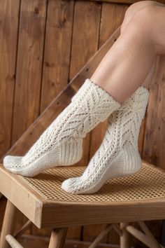 "Hand knitted white socks are inspired by minimalist Scandinavian style. Nordic ornaments, organic wool will keep your feet nice & warm. Natural wool yarns socks designed to be worn with shoes and boots. Ideal to wear during active outdoor time while walking, hiking. Durability Ideal for chilly autumn, winter weather. Hand knitted of 100% natural sheep wool. +𝑨𝒅𝒅𝒊𝒕𝒊𝒐𝒏𝒂𝒍𝒍𝒚 𝑰 𝒂𝒎 𝒂𝒅𝒅𝒊𝒏𝒈 𝒍𝒊𝒏𝒆𝒏 𝒃𝒂𝒈 𝒇𝒐𝒓 𝒑𝒓𝒐𝒕𝒆𝒄𝒕𝒊𝒏𝒈 𝒘𝒉𝒊𝒍𝒆 𝒊𝒕 𝒊𝒔 \"𝒓𝒆𝒔𝒕𝒊𝒏𝒈\" 𝒇𝒐𝒓 Long Knitted Socks, Comfortable Knitted White Socks, White Knitted Socks For Winter, White Knitted Winter Socks, Comfortable White Knitted Socks, Comfortable Knitted Cream Socks, Comfortable Cream Knitted Socks, Comfortable Warm White Knee-high Socks, Casual White Knitted Socks