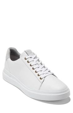 This casual-cool sneaker in a court-inspired design is crafted from leather with precision engineering that follows the contours of your foot for an exact fit. This closet-staple is ultracushioned and lightweight with a GRAND cupsole construction for unmatched comfort from the very first wear. Cushioning: absorbs impact and distributes weight for consistent, buoyant comfort under each step Lace-up style Leather upper/textile lining/rubber sole Imported One or more major components contains at le Up Styles, Leather Working, Mens Shoes Sneakers, Cole Haan, Low Top, Top Sneakers, Rubber Sole, Leather Upper, Men's Shoes