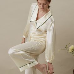 Inspired from the 30’s-40’s chic, this timeless vintage set of suits pants and shirt is a masterpiece of flair. A delicate « Love » french embroidery on the collar was placed to remind you of the great lot of gentleness you are harboring along with your natural elegance. The perfect set to mix & match to transcend the loungewear category.   It is made of 90% Organic Mulberry Silk with low carbon footprint and free of any harmful pollutants & 10% Spandex Pure for a stretch fabric and less wrinkle Silk Short Set, Unique Pajamas, Loungewear Brand, Chelsea Collar, Silk Loungewear, Pajamas Silk, Basic Dress Pattern