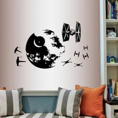 the star wars wall decal is on display in a room with bookshelves