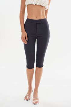 The CELINE Stretch Twill Capri is a must-have for the trendy woman. Crafted from flattering stretch twill fabric and featuring a retro-inspired cropped length, it effortlessly blends comfort and style. Pair it with kitten heels or slip-on pumps for an effortlessly chic look. Slip On Pumps, Swim Accessories, Twill Fabric, Look Chic, Retro Inspired, Skirt Pants, Dress Accessories, Short Pants, Best Sellers