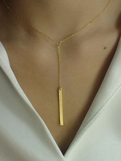 For Ready-to-ship items search here, https://etsy.me/39BDvMS Dainty Bar Necklace / Skinny Vertical Bar / Silver Gold plated Necklace / Simple Everyday Necklace / Bridesmaids Gift About Features- * Made to order * Materials: 925 Sterling Silver * Gold color: Yellow Gold Plating, White Gold Plating, and Rose Gold Plating * Bar dimensions: 36mm long x 3mm wide * Layaway Plan Available * SKU: N173 As a reference, I've included the widths of coins for your visual reference: Dime = 1.25mm Penny = 1.4m Minimalist Pendant Chain Necklace For Party, Formal Necklace With Adjustable Chain And Rectangular Pendant, Formal Necklace With Rectangular Pendant And Adjustable Chain, Formal Necklace With Delicate Chain And Rectangular Pendant, Minimalist Yellow Gold Necklace For Party, Elegant Pendant Necklace With Adjustable Length, Formal Jewelry With Clavicle Chain And Rectangular Pendant, Minimalist Party Necklace With Adjustable Length, Gold Rectangular Pendant Jewelry For Wedding