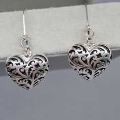 Vintage puff heart earrings. Silver-tone metal with black enamel pierced earrings. Dangle earrings for Valentine's day. Earrings size: 4x2 cm/1.5x0.8 inches. Mark: unsigned. Condition: perfect vintage. Maybe you want to see other earrings too: https://www.etsy.com/shop/VintageVoyageLT?ref=seller-platform-mcnav&section_id=32054783 You can write me a message if you have any questions. Glad you visited my store! Have a great time! Cheap Vintage Dangle Heart Earrings, Metal Heart Drop Earrings Pierced, Metal Heart-shaped Drop Earrings, Pierced Metal Heart Drop Earrings, Black Dangle Heart Pierced Earrings, Black Metal Earrings For Valentine's Day, Black Metal Earrings With Heart Charm, Pierced Metal Earrings Open Heart Shape, Black Heart Drop Earrings