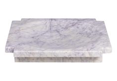 a white marble table top on a white background