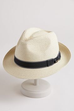 This packable, retro style fedora offers style, nostalgia, and summer shade, for expressive headwear that pairs with any outfit. A bold grosgrain and bow accent the narrow brim, while CoolMax technology keeps you comfortable all season. Comfort sweatband. Classic Fedora Hat For Spring, Adjustable Fedora Hat For Travel, Classic Brimmed Fedora For Spring, Adjustable Panama Hat For Summer Travel, Adjustable Fit Panama Hat For Summer Travel, Classic Fedora Hat With Upf 50+, Adjustable Fit Summer Panama Hat For Travel, Classic Fedora Hat Bands For Spring, Summer Travel Panama Hat With Adjustable Fit