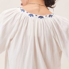 Our embroidered V neck top made of dreamy crinkle cotton crepe will be your go-to this summer! It's easy to wear, flows beautifully, and features lovely blue embroidery that gives it that extra something special. Dress it up or down all season long! Cotton Gauze Top, Crinkle Cotton, Special Dress, Gauze Top, Blue Embroidery, V Neck Top, V Neck Tops, V Neck Tee, Something Special