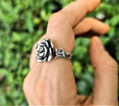 Unique design Rose Flower RingPure 925 Sterling Silver This beautiful elegant Flower Ring has been Fabulously casted with .925 Sterling SilverThe weight of the Ring is 8.5 grams*please inquire if you don't see your size listed*Please allow 2-3 weeks shipping as we are in Bangkok Thailand at this time.We are a Los Angeles based company operating out of Thailand so that we may bring you the highest quality items at the most competitive prices. Just search and compare. We only offer authentic items Adjustable Sterling Silver Rose Design Ring, Adjustable Sterling Silver Flower Ring With Rose Design, Silver Flower Ring With Rose Design, Sterling Silver Rose Gold Flower Ring, Sterling Silver Rose Design Flower Ring, Silver Rose Ring Jewelry, Silver Flower-shaped Rings With Rose Design, Sterling Silver Rose Flower Ring For Anniversary, Sterling Silver Rose Flower Ring With Rose Design