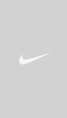 a white nike logo on a gray background