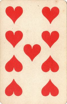 playing cards with red hearts on them