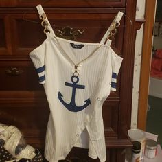 Nib Nautical Off The Shoulder Top. White With Blue Anchor. Gold Zipper And Shoulder Detail. Pit To Pit 16 Waist Across 17 Neck To Bottom 19 Nautical Beach Tops For Summer, Nautical Tops For Beach In Summer, Nautical Style Beach Tops For Summer, White Nautical Tops For Vacation, Nautical Blue Top For Beach, White Sailor Top For Summer, White Nautical Tops For Spring, Blue Anchor, Off The Shoulder Top