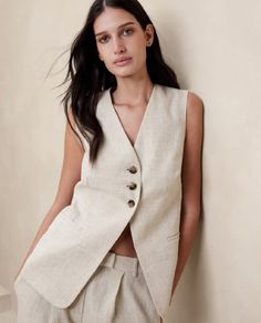 ▶ ABOUT THE TOP: This natural linen vest is a statement of style. Perfect for a day out at the office or a casual brunch with your friends. Made from 100% organic linen fabric, the vest has a regular fit and we offer it in plus sizes up to 5XL. ▶ ITEM DETAILS: * Top made with 100% organic linen and is fully lined with organic cotton * The model is 5'7 tall and wearing size M. * Handmade item, crafted to perfection. * The length of the vest is 29 inches  ▶ FABRIC: * Made from 100% organic and eth Long Vest Outfit, Linen Waistcoat, Waistcoat Outfit, Linen Vest, Long Vest, Banana Republic Women, Vest Outfits, Organic Linens, Luxury Linen