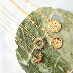 "Beautiful and lovely sunburst pendant necklace. Made of gold sunburst pendant with skinny gold plated brass chain. Soft and simple. Great for gift , everyday or special occasion. Your item will ship in a gift box. Please feel free to contact me if you have any question. ♥ Length 14\" - 20\" ♥ Pendant 5/8\" ♥ Gold plated over brass ♥ Creation Time: 1 - 3 days ♥ See more Rudiana Accessories Rudiana.etsy.com" Gold Starburst Necklace For Gift, Dainty Gold Starburst Necklace, Dainty Gold Charm Necklace With Sun Design, Gold Dainty Sun Design Charm Necklace, Cactus Necklace, Necklace Sun, Pineapple Necklace, Gold Sunburst, Eagle Necklace