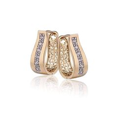 Fabulous earrings at Feshionn IOBI prices. 18K Gold plated oblong hoop with 6 channel set crystals on front side, and a filigree design on the other side, but can be worn backwards to reveal filigree on the front. Occasion: Special Occasion, Everyday wear, Professional, Birthdays, Holidays Material: Choose 18K Yellow or White Gold plated. Crystal Stones. Size: Earring 22mm x 8mm, Stones: Crystals are 2mm each. There are total of 12 crystals in a pair (0.36 Ct weight). A truly amazing and unique Gold Bali, Filigree Hoop Earrings, Crystal Purse, Geode Earrings, Ear Jacket Earring, Thread Earrings, Celestial Jewelry, Star Jewelry, Diamond Hoop Earrings