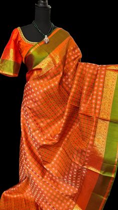 Expertly handwoven with pure ayiram pattu kanchi silk, this brocade saree boasts intricate craftsmanship and vibrant orange hues. Elevate your bridal ensemble with the luxurious feel and stunning design of this kanchi pattu saree, perfect for any special occasion.Pure zari Bridal orange  kanchi pattu saree heavy pallu Brocade saree  kanchi pattu saree with heavy pallu  - CUstom blouse measurements Sarees come done with fall and pico  BLOUSE : Stitched at 36 goes upto 42/43 inches   Pure kanjivaram silk saree with heavy pallu   pure zari kanjivaram saree usa kanchipuram silk saree online shopping usa pure kanchi pattu sarees online usa,bridal silk saree online shopping ,bridal silks online shopping with price, latest collections pattu sarees online, Indian clothing sites usa ,South Indian s Handloom Orange Tissue Silk Saree, Handloom Tissue Silk Saree In Orange, Orange Chanderi Traditional Wear With Zari Weaving, Orange Chanderi Saree With Zari Weaving, Orange Chanderi Saree With Pallu Detail, Orange Handloom Tissue Silk Dupatta, Orange Tissue Silk Dupatta For Festivals, Orange Meenakari Dupatta For Festivals, Orange Tissue Silk Traditional Wear With Self Design