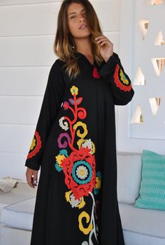 This bohemian multicolour embroidery dress is a an eye catcher! It is an extremely comfortable wear, light and soft and can be used on many occasions - home gatherings, festival parties, summer occasions, dinners, or just in your home to feel comfortable. Fabric : 70% Egyptian Cotton; 30% Polyester. Kaftan measurements in inches : Medium (Size 8/10 USA) Bust : 39-40 Hip : 45-46 Large (Size 12/14 USA) Bust : 44-45 Hip : 50-51 XL (Size 16/18 USA) Bust : 47-48 Hip : 53-54 XXL (Size 20/22 USA) Bust Traditional Multicolor V-neck Maxi Dress, Traditional Embroidered Multicolor Maxi Dress, Multicolor Long Sleeve Dress With Resham Embroidery, Black Floral Embroidered Beach Maxi Dress, Long Embroidered Multicolor Dresses, Spring V-neck Maxi Dress With Multicolor Embroidery, Eid Multicolor Embroidered Maxi Dress, Long Multicolor Embroidered Dress, Multicolor Maxi Length Kaftan With Resham Embroidery