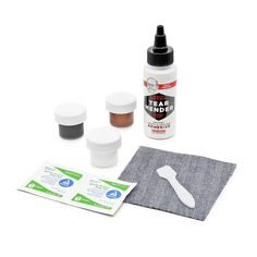 the contents of a craft kit including glue, fabric and other items on a white background