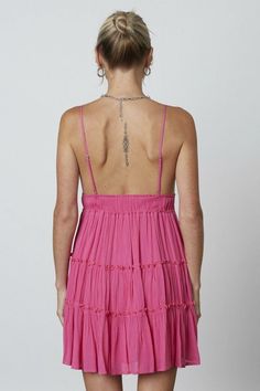 STYLE INFORMATION: Summer days are special in the Brynn Hot Pink Tiered Mini Dress! Lightweight woven fabric shapes adjustable spaghetti straps that fall into a V-neckline bodice, continuing into an open back. Empire waist tops an A-line skirt that falls to a tiered mini hem. DETAILS & CARE: Rayon. Machine wash cold. Imported. SHIPPING: We offer free shipping over $100 for all orders in the Continental US. Lucy White, White Shift Dress, Hot Pink Mini Dress, Empire Waist Tops, Tiered Mini Skirt, Tiered Mini Dress, Boho Pink, Pink Boho, Dress Boho