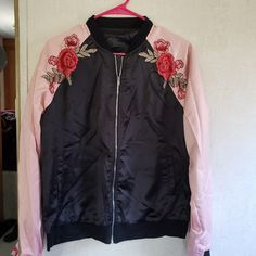 Black/Pink Bomber Jacket W/Embroidered Roses New Without Tags,Never Worn Trendy Pink Embroidered Outerwear, Pink Embroidered Casual Outerwear, Casual Pink Embroidered Outerwear, Casual Pink Outerwear With Floral Embroidery, Spring Pink Outerwear With Floral Embroidery, Pink Floral Embroidered Outerwear For Spring, Pink Outerwear With Floral Embroidery For Fall, Pink Embroidered Outerwear For Fall, Pink Floral Embroidered Outerwear For Fall