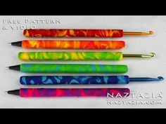 five different colored pens sitting next to each other on top of a white surface with the words free pattern and video written below