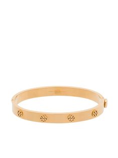 Find TORY BURCH Miller Hinge Stud Bangle on Editorialist. This gold tone Tory Burch Miller hinge stud bangle features the brand's signature double T emblem and push-button closure. We never did win gold in our school sports days, so we’re making up for that now with our collection of Tory Burch jewellery. Looks like we’re on a winning streak with this bangle. Tory Burch Bracelet, Maxi Vestidos, Preppy Jewelry, Bangle Gold, Tory Burch Jewelry, Tory Burch Miller, Engraved Logo, Cartier Love Bracelet, Dream Jewelry