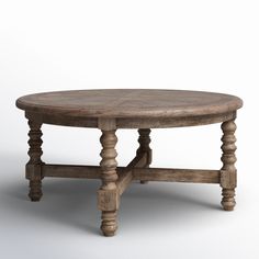 an old wooden table with two legs and a round top, on a white background