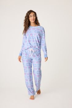 This item is Final Sale. Stay cozy this winter in our Mountain Bound Pajama Set, featuring a charming blue fair isle snowflake print. Crafted from ultra soft velour thermal fabric, this set delivers both warmth and comfort for those chilly nights. The festive design brings a touch of seasonal magic, while the plush texture makes it perfect for lounging or curling up by the fire. Whether for relaxing mornings or restful evenings, this pajama set combines cozy with timeless winter style. Thermal Fabric, Holiday Pjs, Capri Set, Snowflake Print, Bamboo Pajamas, Kickee Pants, Cold Night, Festive Design, Sleepwear & Loungewear