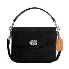 PRICES MAY VARY. Editor's Notes: A more compact Cassie, our 19 is smaller than the original and made for days or nights on the go. This denim & leather designer purse has an elegant fabric lining & is finished with a Signature turnlock closure Denim & Leather: The perfect pair. Crafted with denim and refined calf leather - for an iconic crossbody bag for women and men Style Three Ways: Three interchangeable straps for versatile styling. Detach the crossbody strap and carry as a handbag with the Coach Cassie 19, Coach Cassie, Denim Crossbody, Elegant Fabric, Chain Top, Coach Gifts, Purses Designer, Coach Purses, Chain Strap