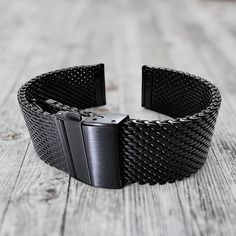 Experience the epitome of luxury with our premium shark mesh watch strap band, a robust two-piece heavy-duty accessory.  Crafted from high-quality black coloured PVD coated stainless steel with a substantial thickness of approximately 2.7mm, this strap is adorned with a stainless steel deployment push-button clasp for added durability. The weight of these high-quality straps is a testament to their superior construction, while the flexibility of the mesh ensures a comfortable and adaptive feel o Steel Watch, Stainless Steel Watch, Push Button, Watch Strap, Accessories Watches, Jewellery And Watches, Watch Bands, Bracelet Watch, Wrist Watch