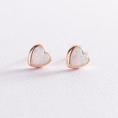 Rose gold earrings studs, Earrings heart, Simple gold earrings, Minimalist gold studs, Earrings with opal Material: 585 rose gold Stone: opal - 0.2 g Average weight: 1,77 g. ------------------------------------------------------------------------------------------------------------ Thank you very much for your interest to our jewelry! All our settings are Nickel free, hypoallergenic and manufactured by ourselves to ensure the highest standards of our jewelry Our clover jewelry: https://www.etsy. White 14k Gold Earrings For Valentine's Day, Minimalist White Earrings For Valentine's Day, White 14k Gold Heart Earrings Gift, 14k Gold White Heart Earrings For Gift, Dainty Opal Earrings For Gift, Minimalist Opal Earrings As Gift, Minimalist Opal Earrings For Gift, Dainty Heart Cut Earrings For Gift, Minimalist Rose Gold Heart Earrings Gift