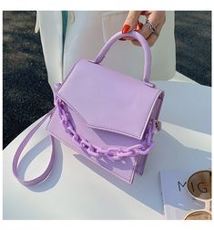 Product information: Color: black. white. red. orange. yellow. purple. khaki Material: PU Suitcase shape: Horizontal Square Top width: 18cm Bottom width: 20cm Height: 16cm Thickness: 6cm Trendy Purple Rectangular Shoulder Bag, Trendy Purple Rectangular Box Bag, Trendy Purple Top Handle Bag, Trendy Handheld Purple Bag, Purple Top Handle Box Bag For Daily Use, Trendy Purple Satchel For Shopping, Chic Purple Square Box Bag, Purple Rectangular Phone Bag For Daily Use, Trendy Purple Phone Bag For Daily Use