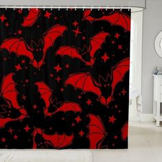 a red and black shower curtain with stars on it