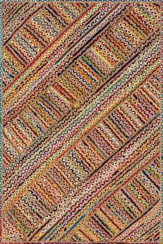 a multicolored rug is shown in the shape of a rectangle, with different colors