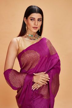 Look your ethnic best at weddings and special occasions in this purple tussar Banarasi saree. It is adorned with antique zari buta. The saree comes with a green blouse piece. Disclaimer: The shown stitched blouse on the model is for display purpose only. The saree comes with a matching blouse piece and finished with fall and piko. Bollywood Style Purple Raw Silk Pre-draped Saree, Festive Purple Tussar Silk Pre-draped Saree, Purple Katan Silk Pre-draped Saree With Zari Work, Purple Pre-draped Saree With Zari Work In Raw Silk, Purple Pre-draped Saree With Zari Work, Purple Raw Silk Pre-draped Saree With Zari Work, Purple Bollywood Style Pre-draped Raw Silk Saree, Purple Tussar Silk Blouse Piece With Cutdana, Purple Slub Silk Saree With Traditional Drape