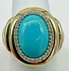 14K YELLOW GOLD RING, WITH AN OVAL NATURAL TURQUOISE GEMSTONE ENCIRLED WITH DIAMONDS. THE RING IS MARKED: 14K FP. SIZE 10. WEIGHT 7.4 GRAMS. IN GOOD CONDITION WITH SOME LIGHT WEAR. Diamond Halo Ring, Ring Pictures, Halo Diamond Ring, Yellow Gold Ring, Halo Ring, Halo Rings, Natural Turquoise, Diamond Halo, Turquoise Gemstone