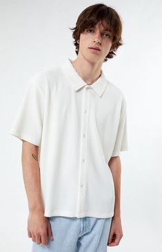 Pull a 'fit together on the fly when you have the Ribbed Woven Camp Shirt on hand. This PacSun staple has a collared neckline, short sleeves, button closures, a standard fit, and a ribbed fabrication for some texture.


	Collared neckline
	Short sleeves
	Standard fit
	Button closures
	Ribbed
	Model is wearing size medium
	Model Measurements: 6'1” Height, 31” Waist, 33” Inseam Pacsun Outfits Mens, Men’s Cropped Button Up, Relaxed Fit Cotton Button-up Camp Shirt, Cotton Relaxed Fit Button-up Camp Shirt, Pacsun Mens, Men Cream, My Mobile Number, Camping Shirt, Pacsun