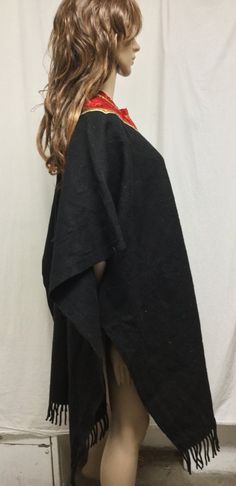 "Poncho top,Indian Poncho,Ethnic Large,Poncho ,Black ,Red Velvet collar, Fringed Measurements\" Width 35\" Length 38\" Fringe 2 1/2\" Good condition J 477 Poncho top,Indian Poncho,Ethnic Large,Poncho ,Black ,Red Velvet collar, Fringed" Traditional Black Cape For Fall, Black Shawl Poncho One Size, Black One Size Poncho For Beach, Black Beach Poncho One Size, Black One Size Beach Poncho, Traditional Black Cape For Festival, Traditional Black Festival Cape, Black Bohemian Poncho With Batwing Sleeves, Traditional Black One-size Poncho