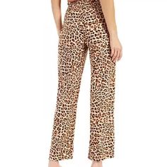 Pull-On Style Cheetah Print; Tie-Front Belt; Elasticized Waist Polyester/Spandex Machine Washable Waist Approx 34.5” Inseam 31” Stretch Tiger Print Bottoms, Fitted Leopard Print Pants For Summer, Stretch Leopard Print Loungewear Bottoms, Leopard Print Loungewear Pants With Elastic Waistband, Stretch Leopard Print Bottoms For Loungewear, Leopard Print Bottoms For Summer Loungewear, Leopard Print Loungewear Bottoms For Summer, Casual Tiger Print Bottoms For Summer, Stretch Leopard Print Pants For Loungewear