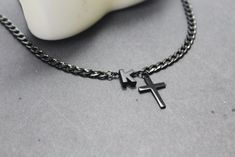 No matter who is President. Jesus is the King. This Personalized black cross necklace is a wonderful gift for Confirmation ,this  Personalized Cross Necklace is best  Confirmation Sponsor Gift, godparent gifts ,christening gifts  Chain and clasp : Very High quality waterproof stainless chain.thick chain and All findings Dimension: 4.8 x 6.5 mm. Snake black chain is 2 mm **Adorable cross pendants , 20 x14 mm,black letter 8 mm ,silver letter 7mm HELP WITH Necklace SIZING: The best way to determine the proper length to order is to drape a string around your neck, and to cut it once you have determined the length that suits you. Use that measurement as a guide to ordering the closest length available in the style of your choice. This initial black cross necklaces created and hand crafted with Personalized Black Cross Pendant Necklace, Personalized Black Jewelry For Birthday Gift, Personalized Black Necklace For Birthday Gift, Black Necklace For Birthday And Mother's Day Gift, Personalized Black Necklace For Birthday, Black Minimalist Jewelry For Birthday Gift, Minimalist Black Jewelry For Birthday Gift, Personalized Black Jewelry For Birthday, Minimalist Black Jewelry For Personalized Gifts