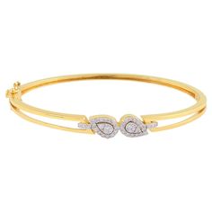 The warm glow of the yellow gold provides the perfect backdrop for the shimmering diamonds, enhancing their natural beauty and adding a touch of timeless elegance to the design. The smooth and polished surface of the bangle ensures a comfortable fit, while the secure clasp closure ensures that the bracelet stays securely in place throughout the day. Item Code :- SEB-6088 Gross Wt. :- 10.25 gm 18k Yellow Gold Wt. :- 10.17 gm Natural Diamond Wt. :- 0.40 Ct. ( AVERAGE DIAMOND CLARITY SI1-SI2 & COLO Plain Gold Bangles, Diamond Bangle Bracelet, Modern Bracelets, Yellow Gold Bangle, Diamond Bangles Bracelet, Yellow Gold Jewelry, White Gold Jewelry, Gold Bangle Bracelet, Diamond Bangle