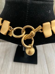 "Beautiful Vintage ANNE KLEIN Matte Gold Modern Classic Statement Collar Necklace Circa 1990's Very good condition...two tiny marks...see photos...barely noticeable Signed Anne Klein Very nice quality and weight Matte gold finish Modern and classic Couture look Statement making necklace Adjustable toggle closure 18\" overall length, 1\" wide" Vintage Gold-tone Jewelry With Toggle Clasp, Formal Gold-tone Metal Toggle Necklace, Retro Adjustable Gold Necklace, Adjustable Retro Gold Necklace, Vintage Gold Metal Toggle Necklace, Vintage Gold Toggle Chain Necklace, Vintage Necklace With Toggle Clasp, Vintage Metal Toggle Necklace As Gift, Vintage Metal Toggle Necklace For Gift