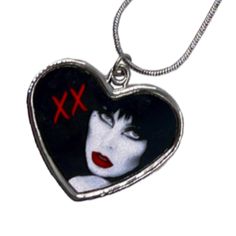 Bootique Valentines Exclusive! Elvira Red Lips Heart Necklace featuring Elvira Mistress Of The Dark in cloassic noir style printed on a heart pendant, heart measuring 1.2 in (3cm) with a zinc alloy chain, chain length 18 in(46cm) with extender to 20in (51cm). Hand printed in the USA. Random Clothing, Ios Themes, Elvira Mistress Of The Dark, Fashion Bible, Cool Piercings, Pendant Heart, Red Necklace, Dream Clothes, Red Lips